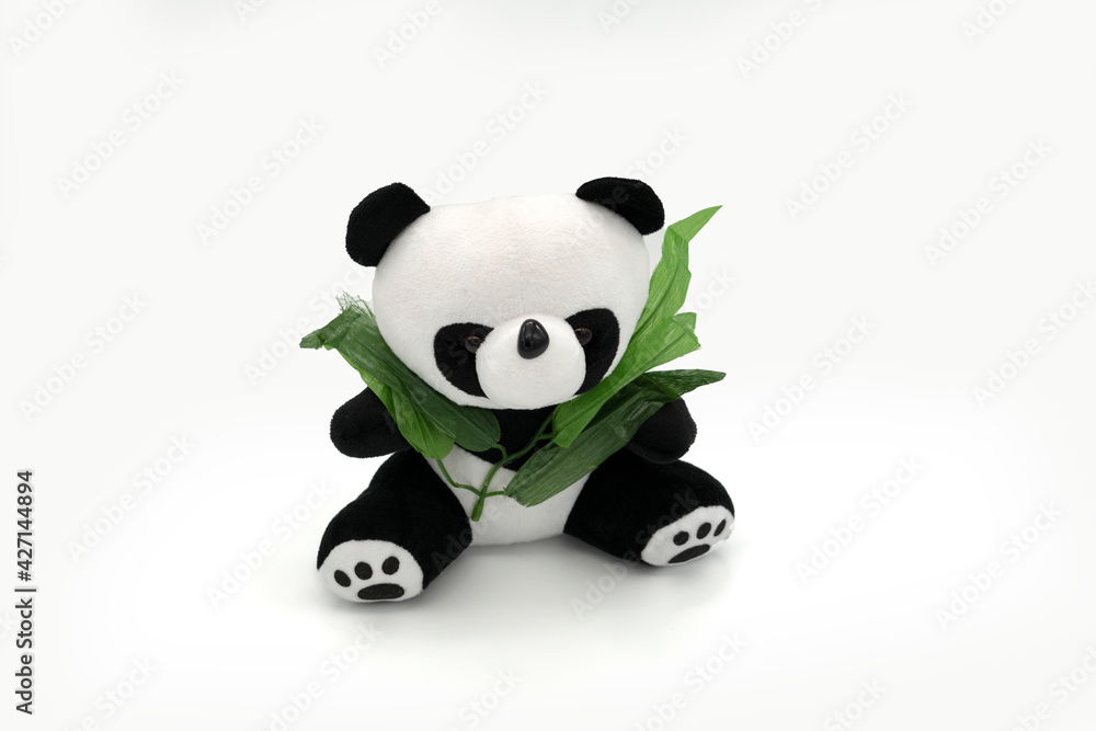 Stuffed panda toy isolated white.