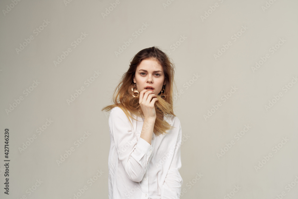 Elegant woman white shirt attractive look close-up Elegant woman white shirt attractive look close-up