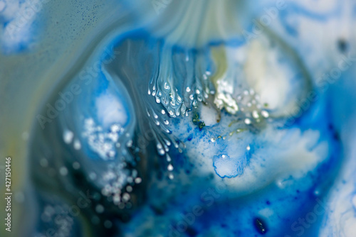 Blue abstract background in fluid art technique.