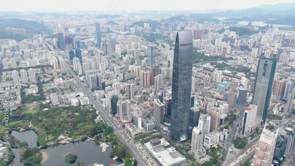 Aerial view over Shenzhen cityscape with massive urban development and skyscrapers. Aerial view over Shenzhen cityscape with massive urban development and skyscrapers.