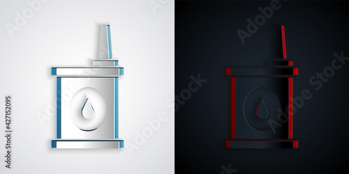 Paper cut Canister for motor machine oil icon isolated on grey and black background. Oil gallon. Oil change service and repair. Paper art style. Vector