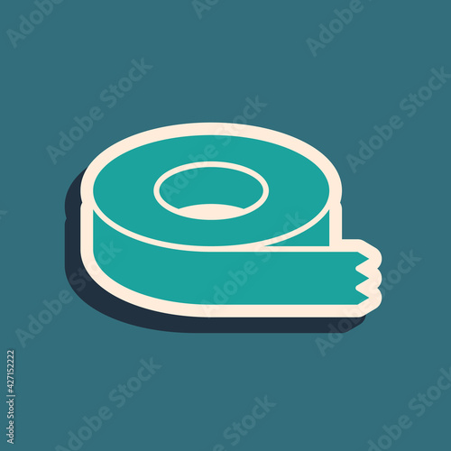 Green Scotch tape icon isolated on green background. Insulating tape. Long shadow style. Vector
