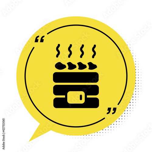 Black Hot sauna stones icon isolated on white background. Spa resort recreation, bathhouse relaxation. Hot stones on electric heater. Yellow speech bubble symbol. Vector