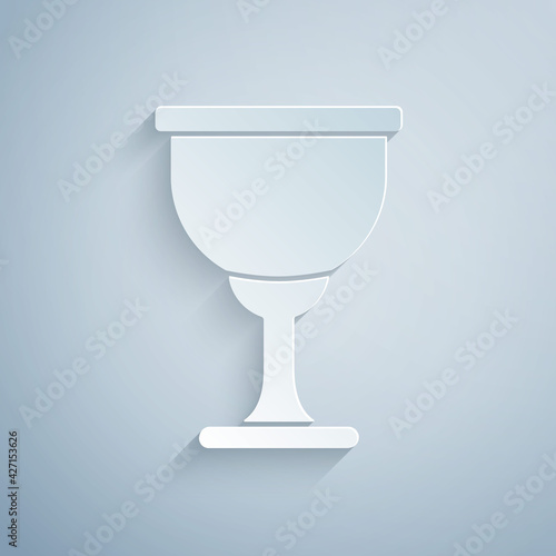 Paper cut Holy grail or chalice icon isolated on grey background. Christian chalice. Christianity icon. Paper art style. Vector