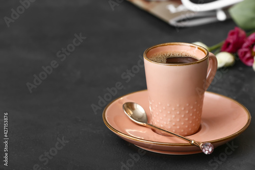 Cup of hot coffee on table ...