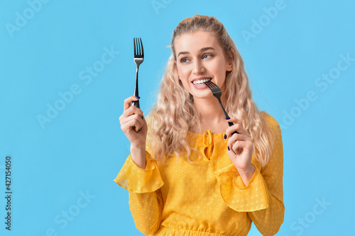 Beautiful young woman with ...