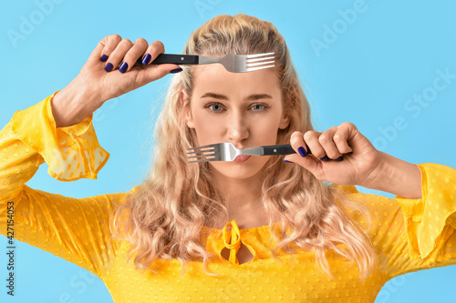 Beautiful young woman with ...