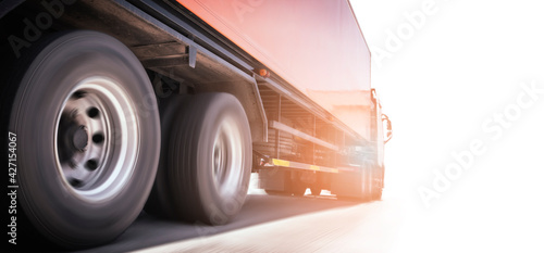 Semi Truck Driving on Road with Copy Space on White Background. Industry Shipment Freight Truck Transportation.  © Siwakorn1933
