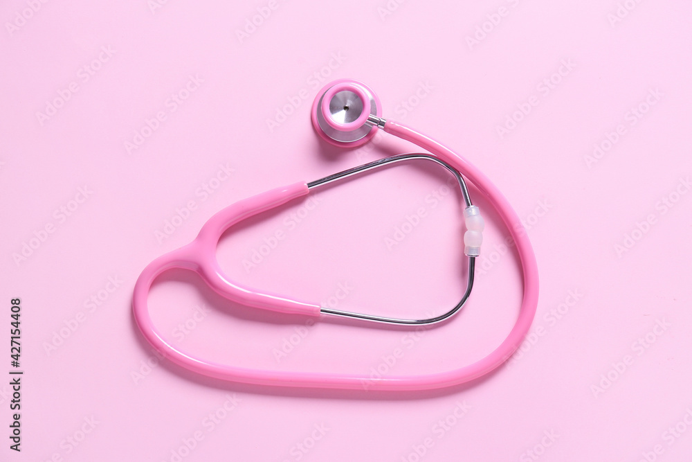 Modern stethoscope on color background Modern stethoscope on color background