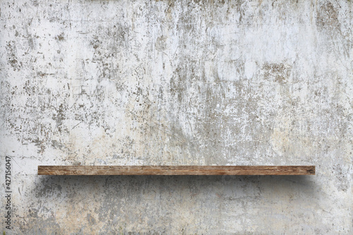 shelf on concrete wall © vlntn
