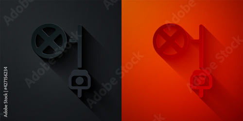 Paper cut Stop sign with camera icon isolated on black and red background. Traffic regulatory warning stop symbol. Paper art style. Vector