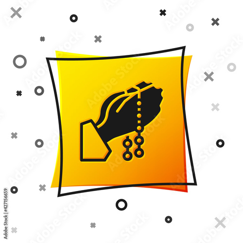 Black Hands in praying position with rosary icon isolated on white background. Praying hand islam muslim religion spirituality religious. Yellow square button. Vector
