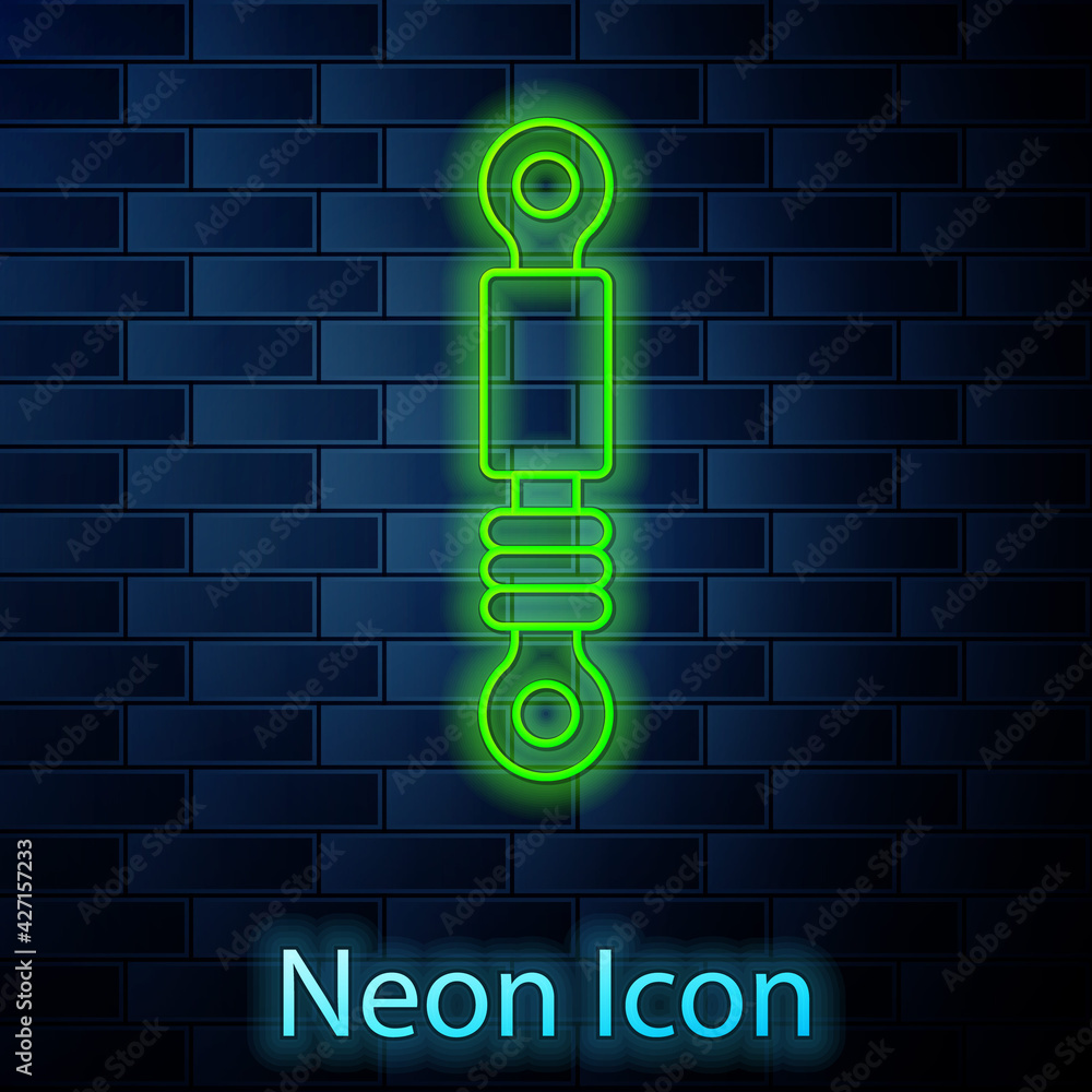 Glowing neon line Shock absorber icon isolated on brick wall background. Vector