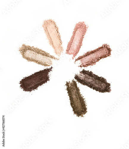 A smashed, neutral toned eyeshadow make up palette isolated on a white background
