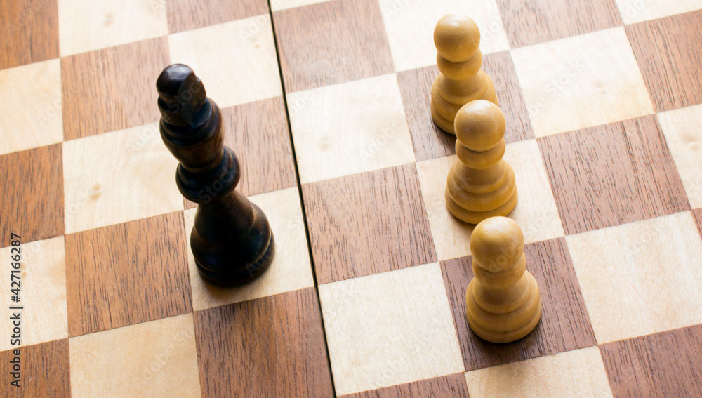 Wooden Chess Set on Wooden Chess Board, Focusing on King