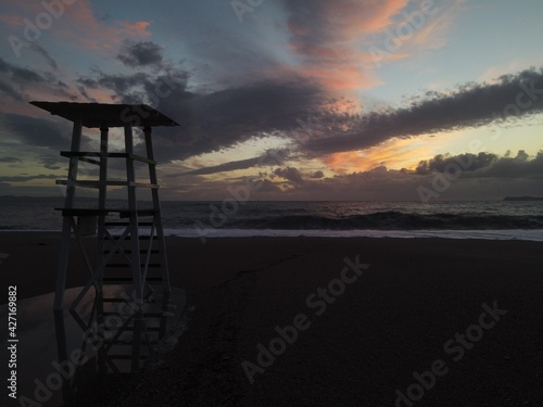 colorful sunset sky and horizon and clouds  in karavostasi beach of perdika in epirus  greece
