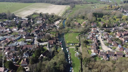 Drone flies backwards over the small village Fordwich, England photo