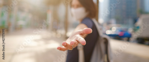 Photography Portrait of young woman wearing in blue dress and white mask