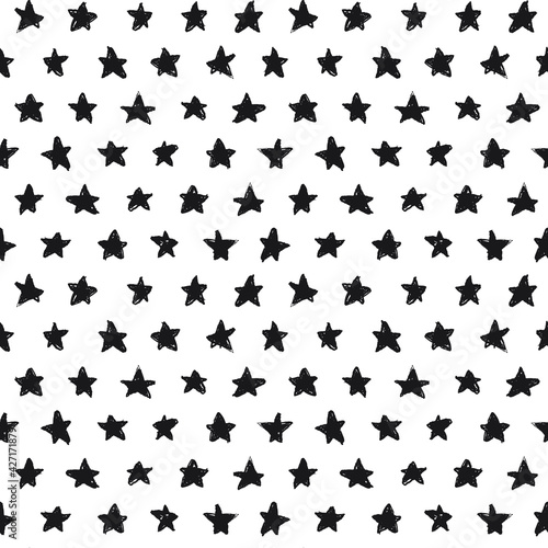 Stars seamless pattern, black. A seamless pattern made with hand drawn stars.
