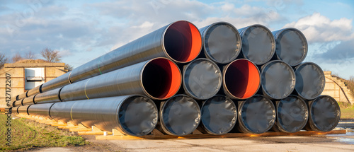 A stack of pipes on the construction site of a gas pipeline that will be laid on the seabed