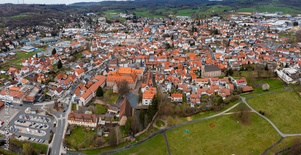 Aerial view of the city Schlüchtern in Germany, Hesse on a sunny day in early spring