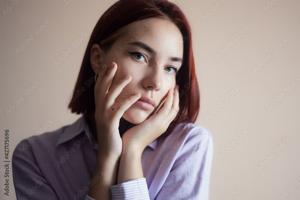 Portrait of a beautiful young woman. Selective focus. Portrait of a beautiful young woman. Selective focus.
