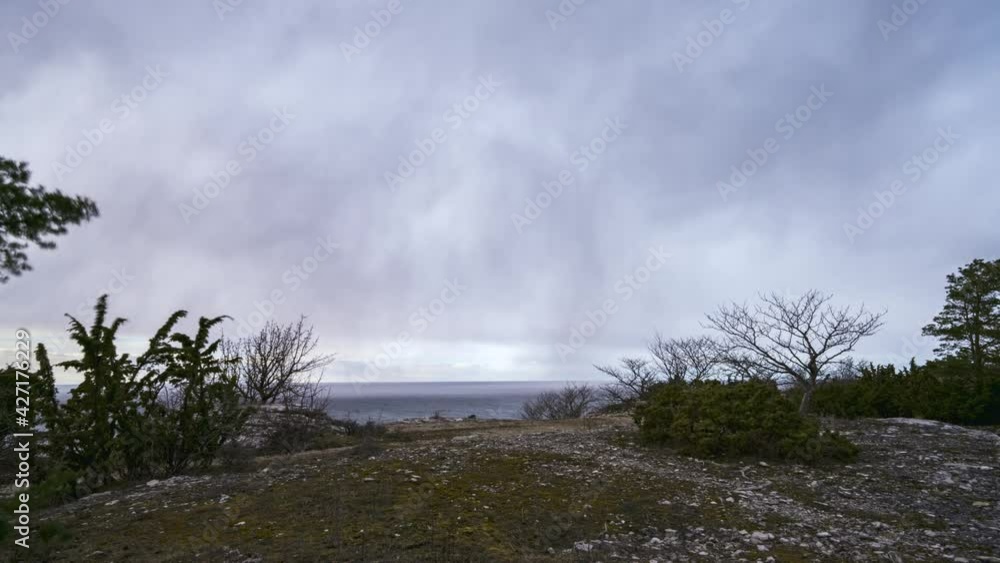 Storm front with snowfall approaching the coast in time lapse Storm front with snowfall approaching the coast in time lapse