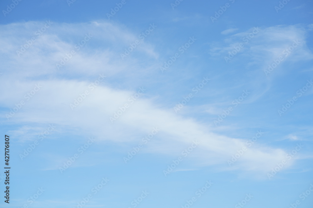 Hello Summer sky is bright blue. There are clouds floating through. Feel relax when looking. See the sun on the sun. Hello Summer sky is bright blue. There are clouds floating through. Feel relax when looking. See the sun on the sun.