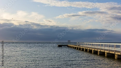 Wallpaper Mural Storm clouds over ocean at sundown in time lapse Torontodigital.ca