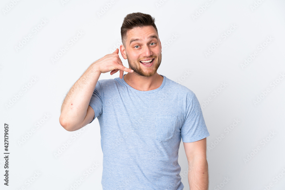 Fototapeta premium Russian handsome man over isolated background making phone gesture. Call me back sign