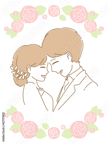 おでこをくっつけてほほ笑む新郎新婦　上下フレーム付き
