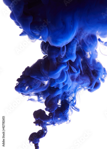 Abstract blue ink drop in water over white background