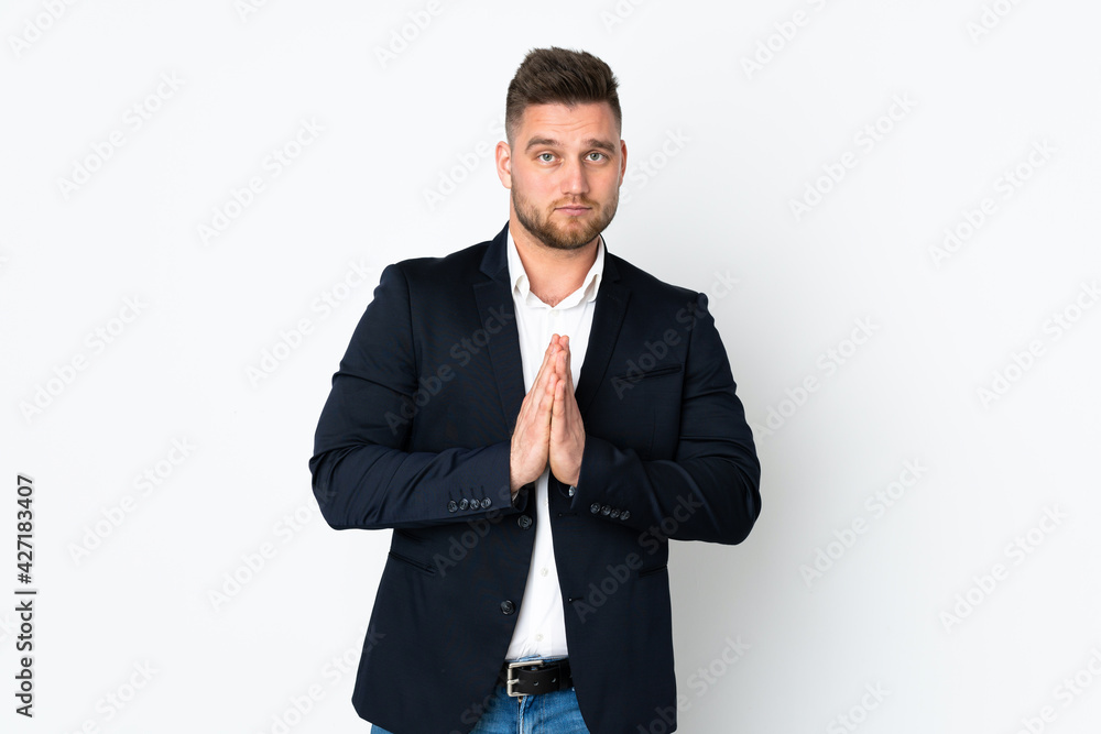 Young Russian business man isolated on white background pleading Young Russian business man isolated on white background pleading