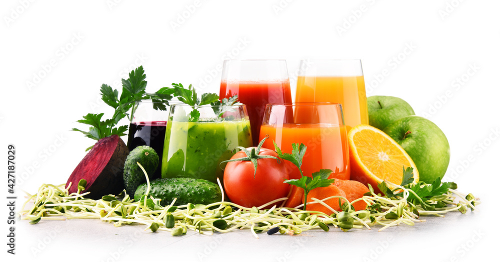 Glasses with fresh organic vegetable and fruit juices Glasses with fresh organic vegetable and fruit juices
