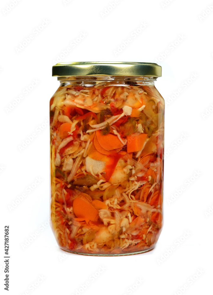 Glass jar with homemade pickled vegetable mix isolated on white background, top view. Glass jar with homemade pickled vegetable mix isolated on white background, top view.