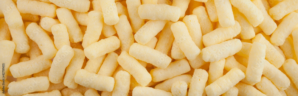 Background and texture of heap of corn sticks. Panorama. View from above. Background and texture of heap of corn sticks. Panorama. View from above.