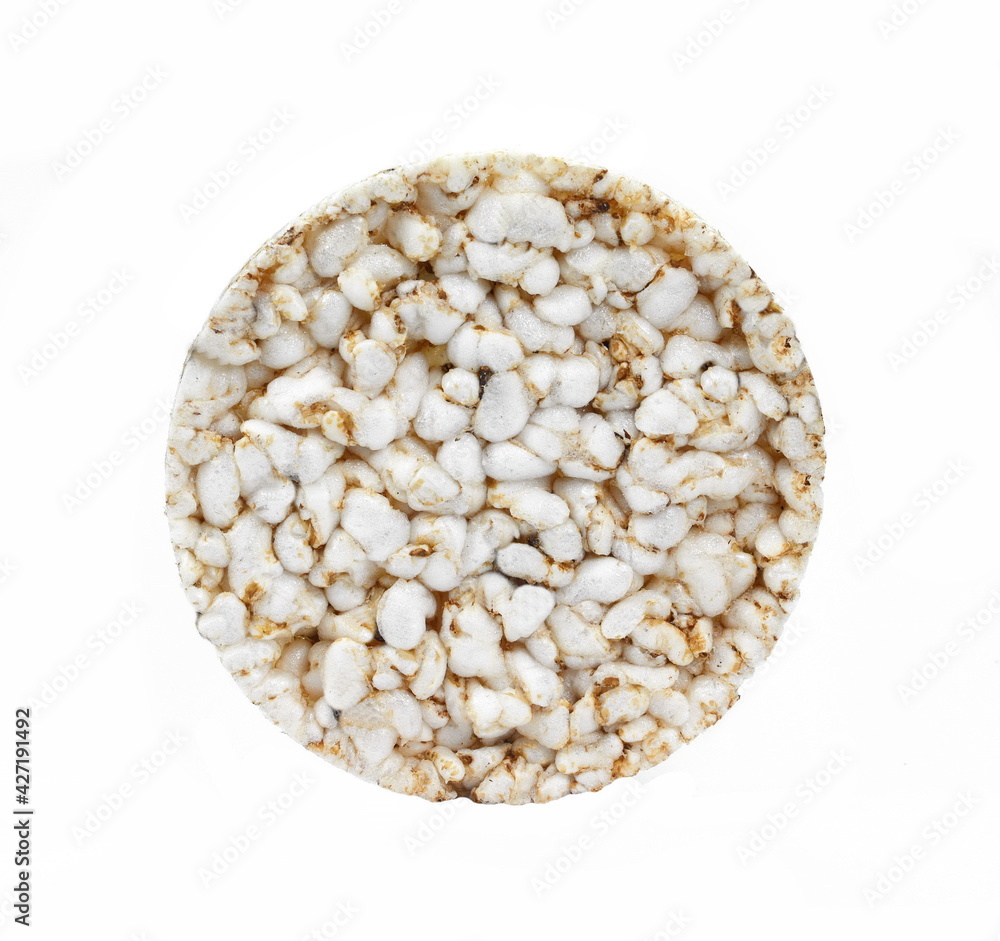Puffed rice cakes isolated on white. Stack of puffed whole grain crispbread isolated on white. Puffed rice cakes isolated on white. Stack of puffed whole grain crispbread isolated on white.