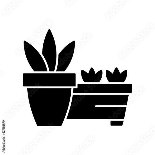 Flower pots and flower beds black glyph icon. Place to grow plants inside house. Gardening equipment and tools. Growing beautiful plants. Silhouette symbol on white space. Vector isolated illustration