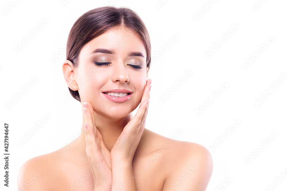 Beautiful girl with closed eyes and perfect skin, with a beautiful smile and clean white teeth.Face care. Cosmetology, beauty and spa. Concept health and beauty.Copy space Beautiful girl with closed eyes and perfect skin, with a beautiful smile and clean white teeth.Face care. Cosmetology, beauty and spa. Concept health and beauty.Copy space