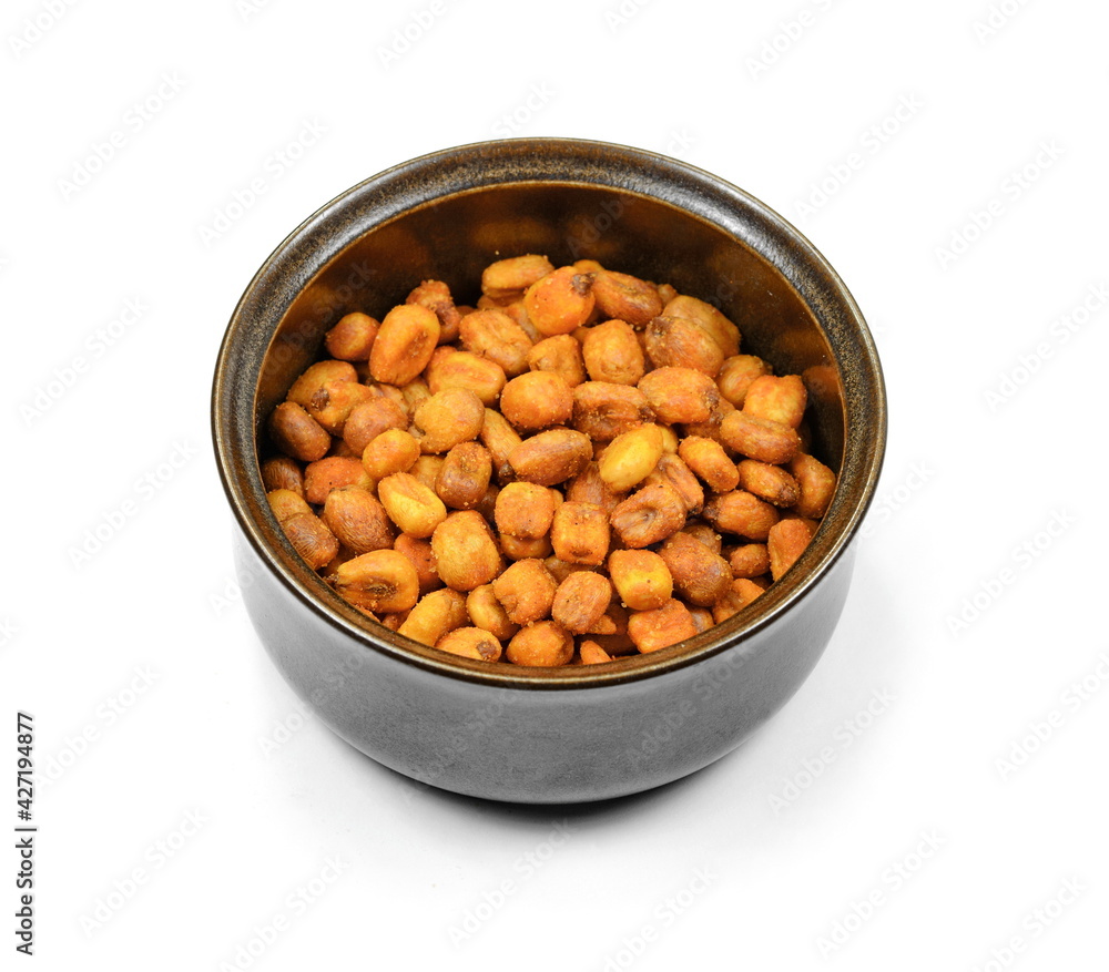 Pile of toasted salted corn in a bowl on a white background. Salted roasted corn with chili pepper. Pile of toasted salted corn in a bowl on a white background. Salted roasted corn with chili pepper.
