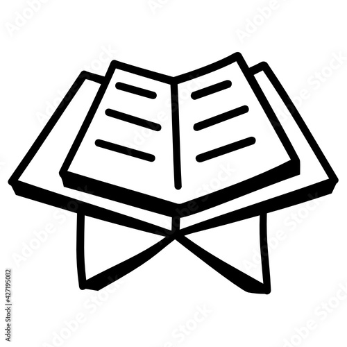 
A holy Al Quran doodle icon in an editable style 

