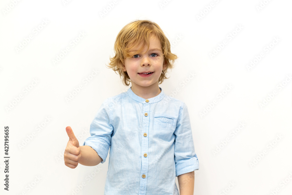 Portrait of a boy looking thumb up. Portrait of a boy looking thumb up.