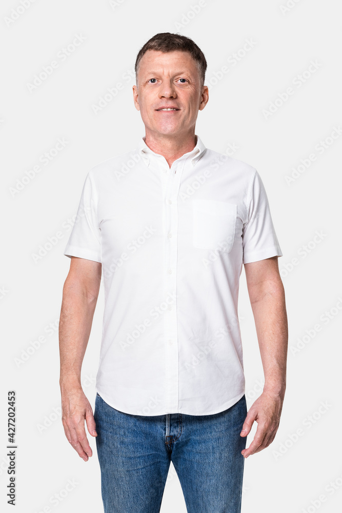 Man wearing white long-sleeve shirts with jeans Man wearing white long-sleeve shirts with jeans