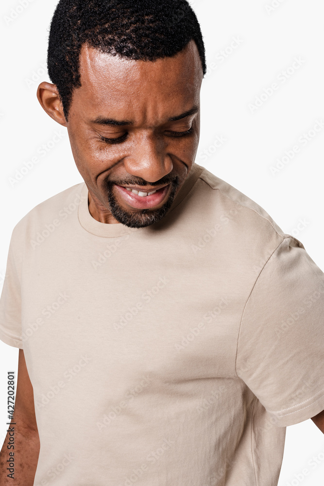 Fototapeta premium Man wearing minimal beige t-shirt