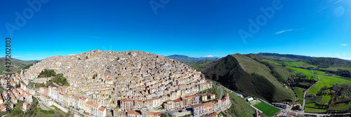 Wallpaper Mural 180 degree photo of the typical village of Gangi with a view of the Etna volcano. Typical Sicilian village. Nature on the Madonie in winter. Wheat fields. Torontodigital.ca
