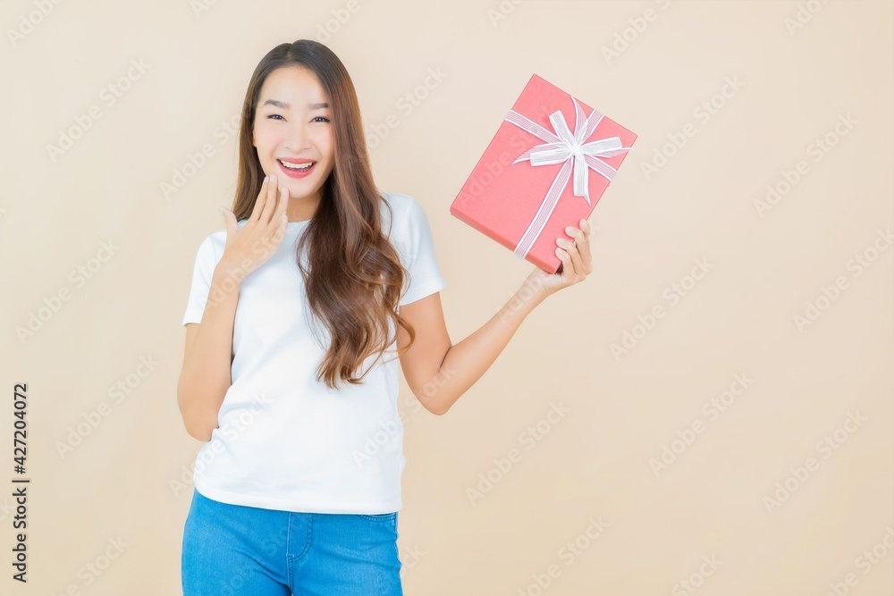 Portrait beautiful young asian woman with red gift box Portrait beautiful young asian woman with red gift box