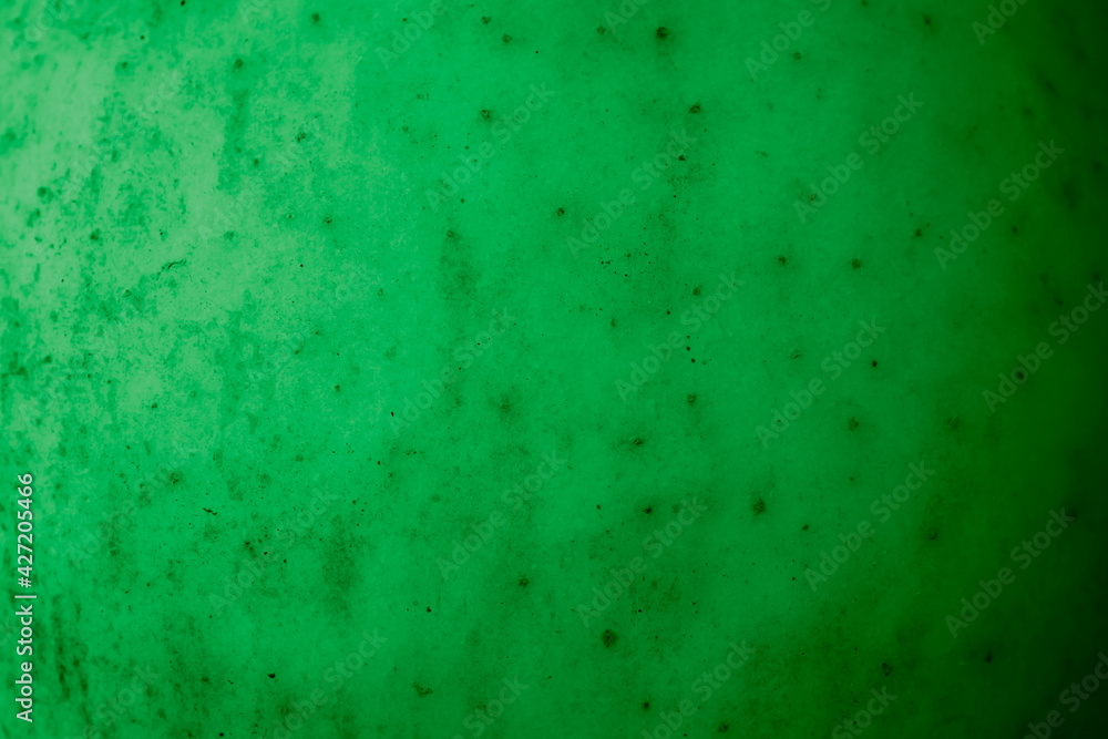 green apple skin with visible details. background