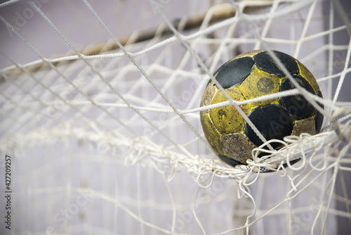 Vászonkép Handball ball in the net, on goal, futsal
