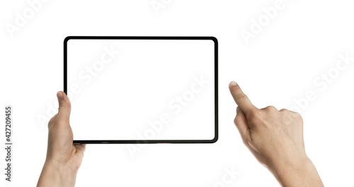 Digital tablet in woman hands on white isolated background. Free space for text.