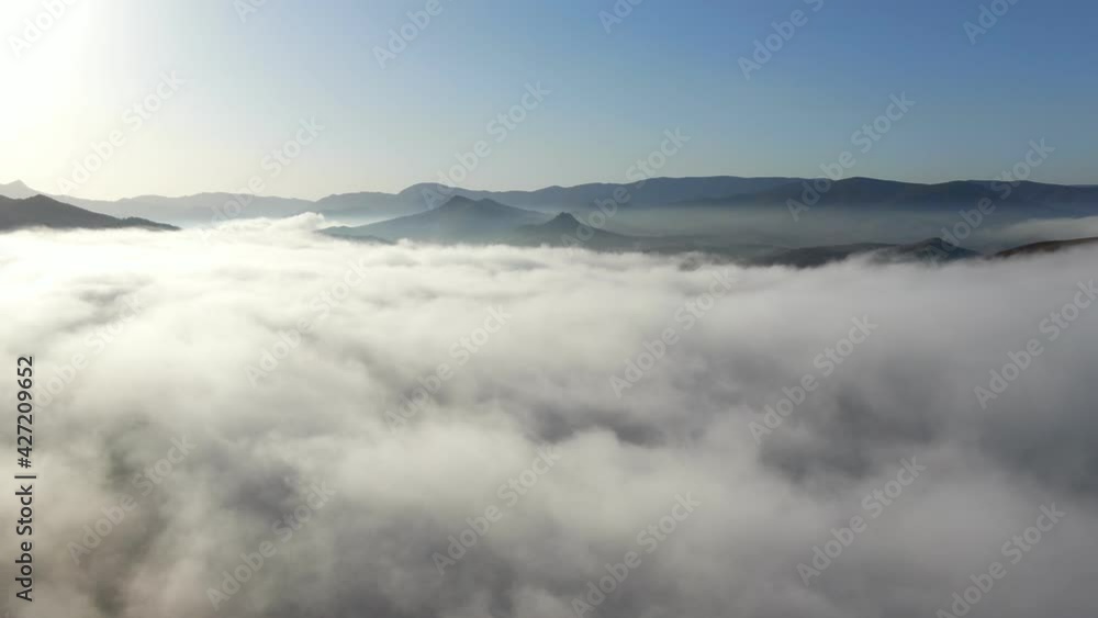 swirling fog among the mountain peaks swirling fog among the mountain peaks
